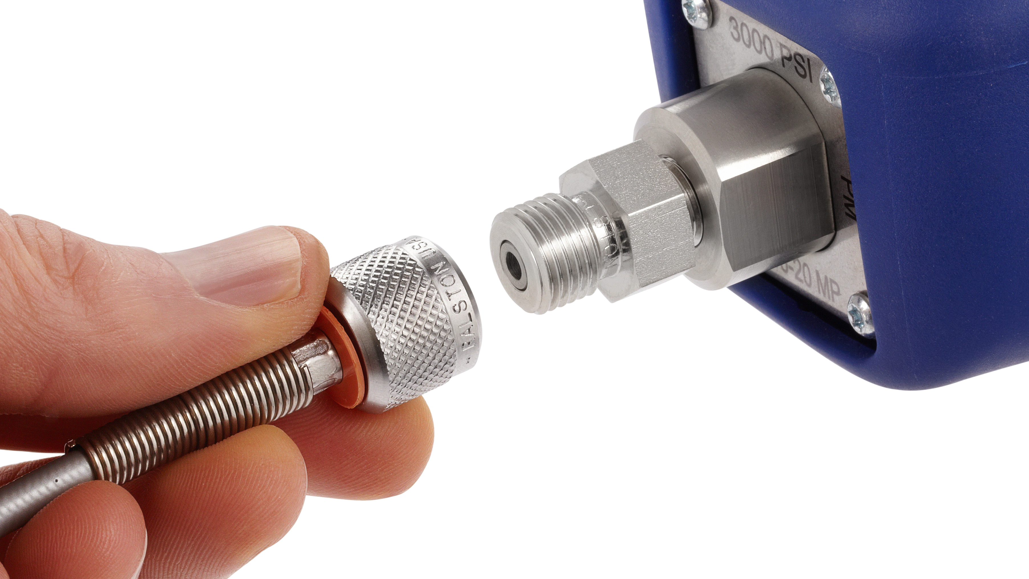 Ralston Quick-test hose fitting being connected to a pressure calibration device
