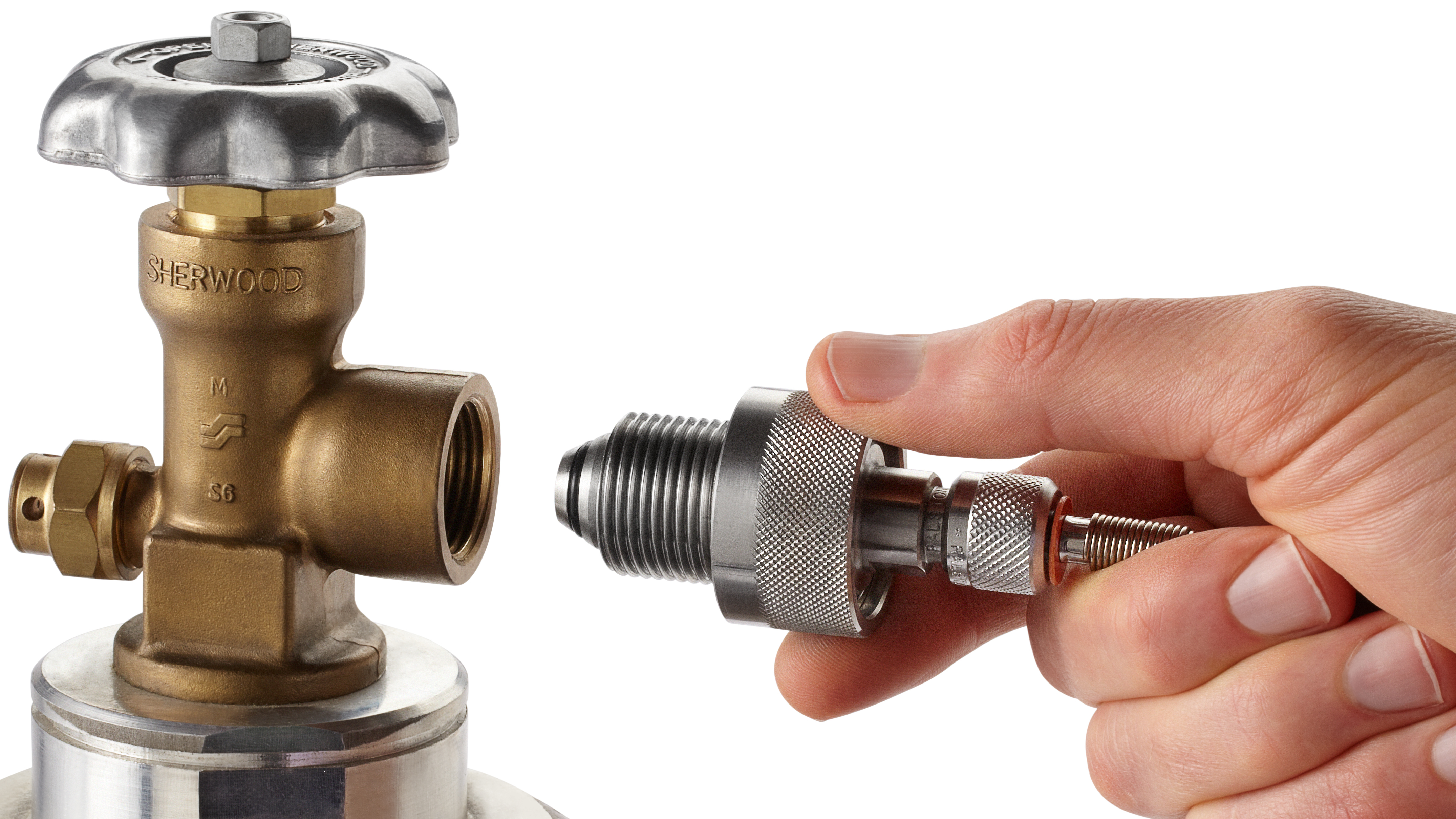 Ralston Quick-test CGA 580 cylinder valve adapter being connected to a compressed gas cylinder