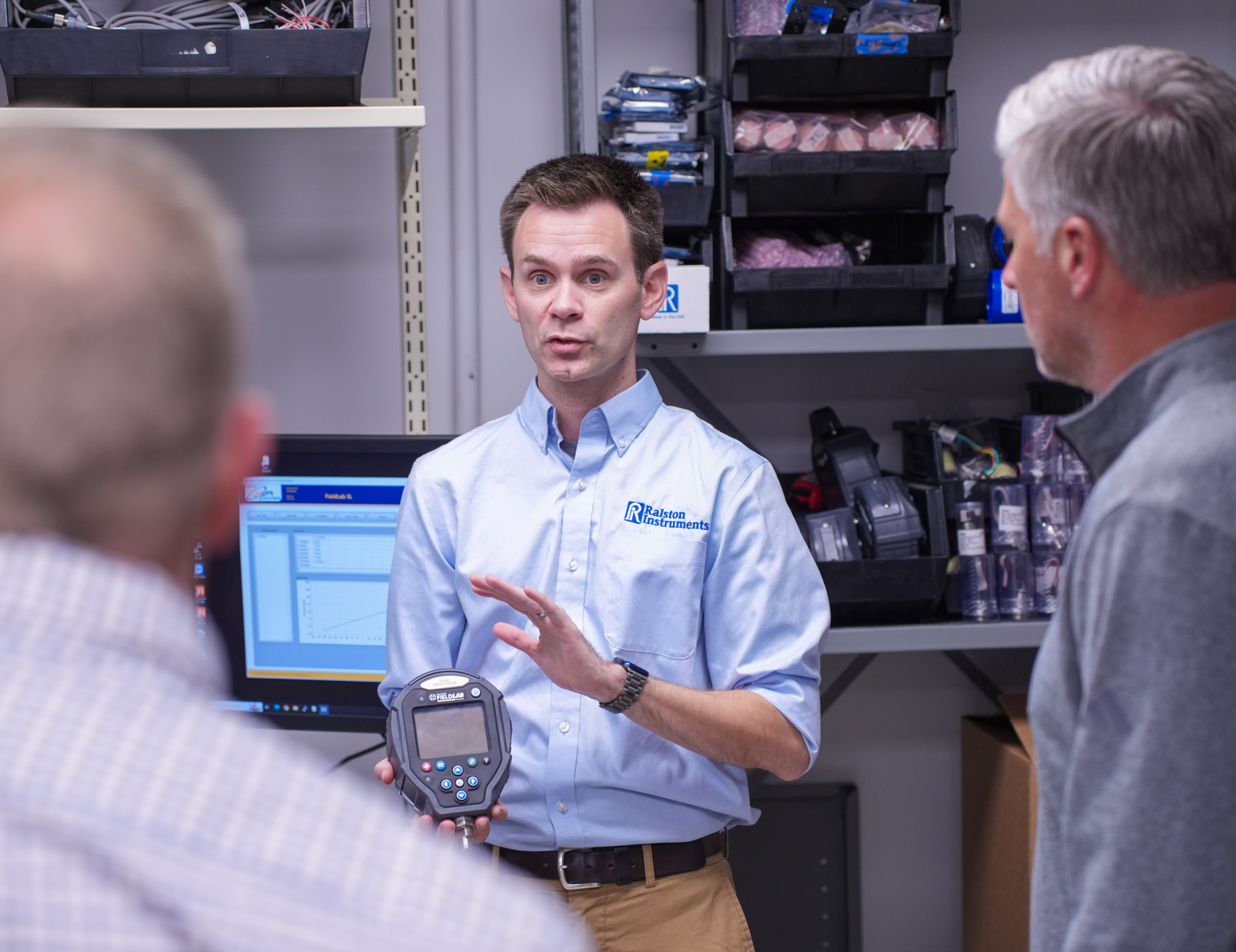 Ralston Instruments team member demonstrating the Ralston FieldLab Gauge during a training session in Newbury Township, Ohio
