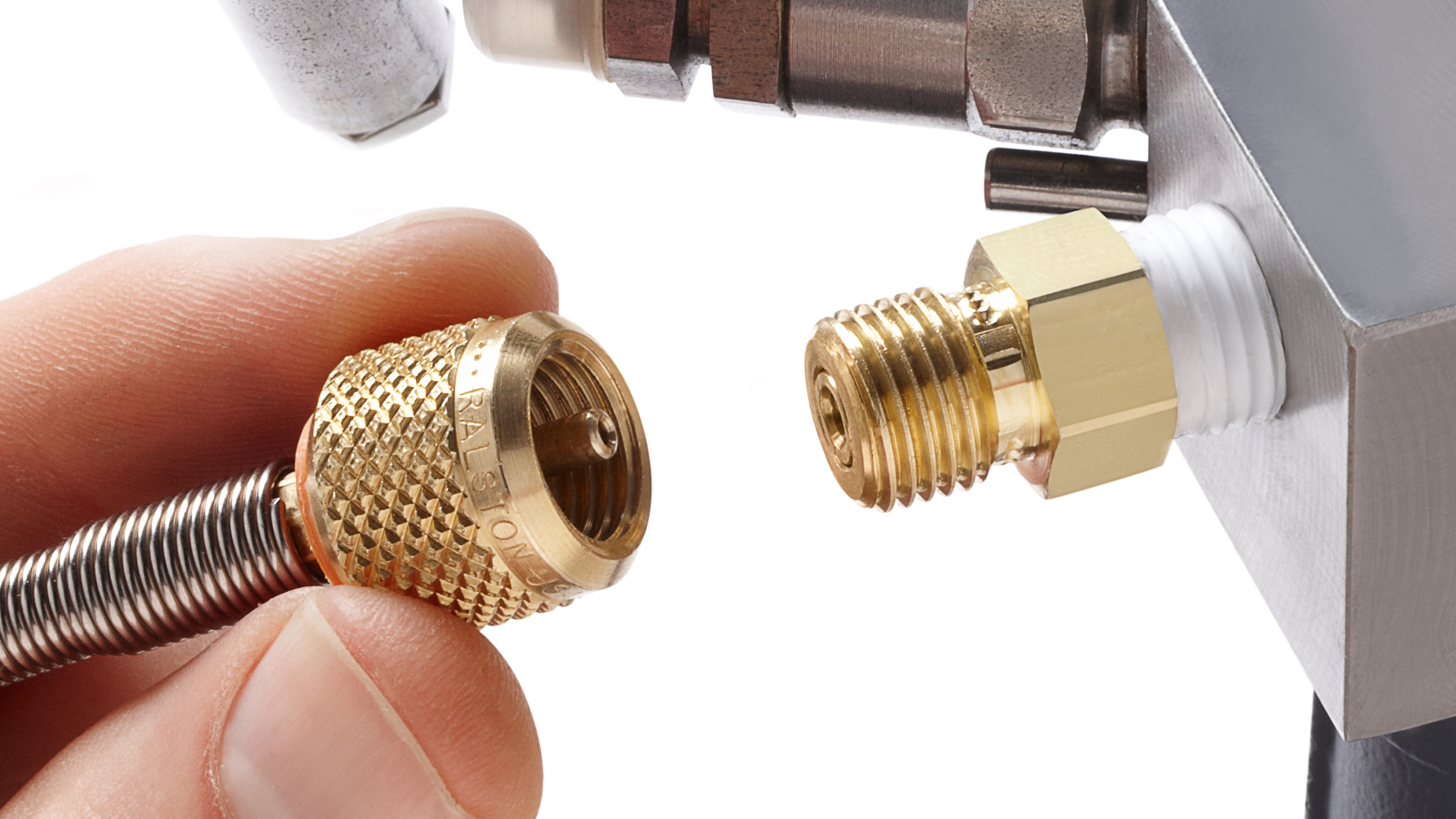 Ralston Quick-test™ adapter and microbore hose used for fast, leak-free pressure calibration connections.