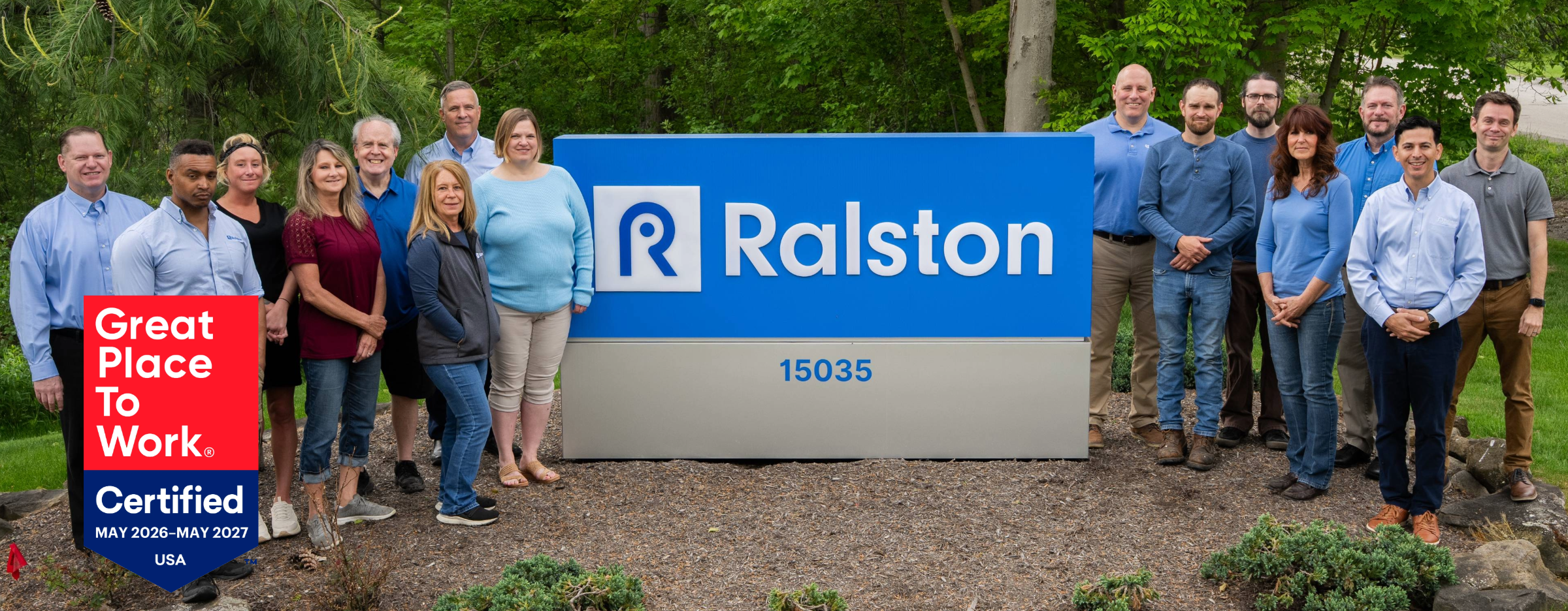 Ralston Instruments team gathered outside the company headquarters after earning Great Place to Work Certification 2026-27