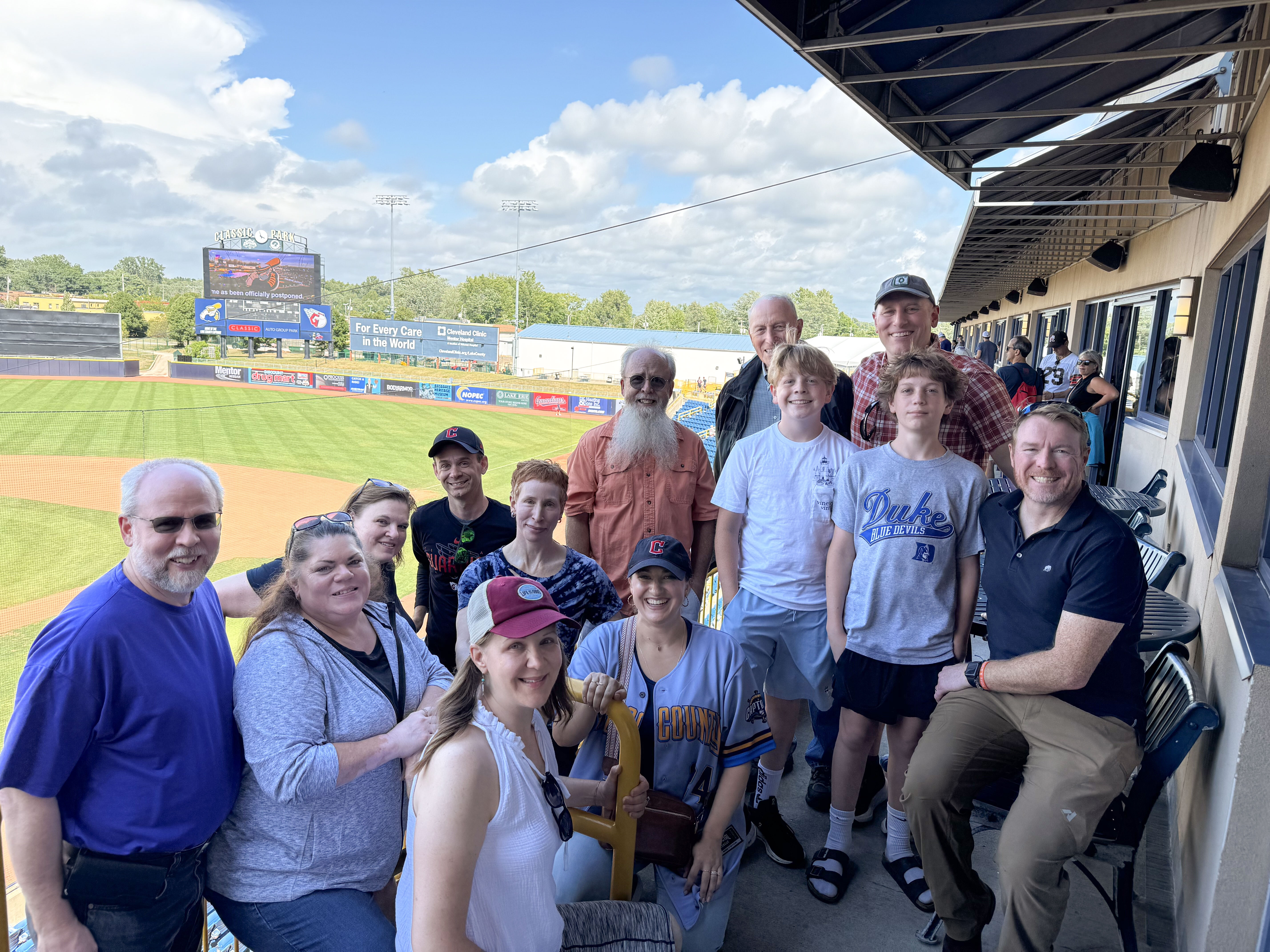 Ralston employees, family, and friends gathered at a local baseball stadium for a company outing.